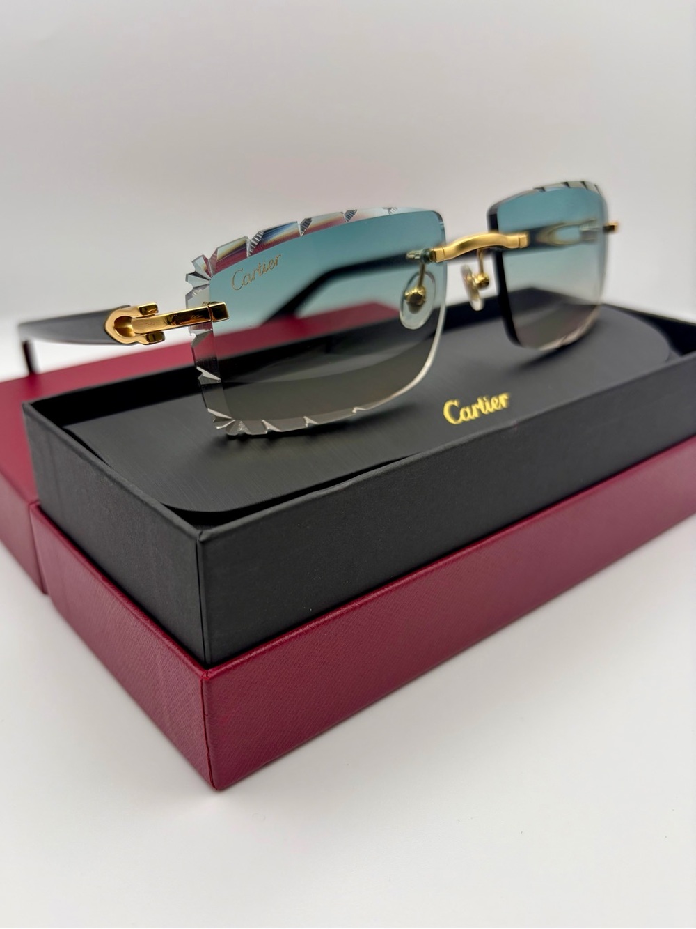 Cartier Rimless Sunglasses in Black and Gold